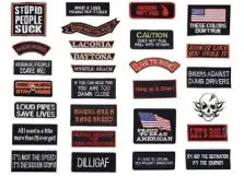 Collection of various stickers with different designs and text on a black background