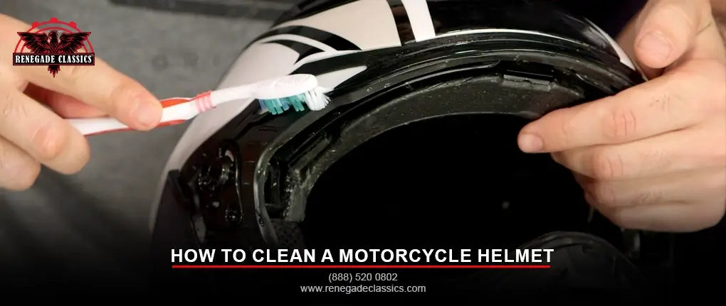 How to Clean a Motorcycle Helmet: A rider cleaning a helmet with a soft brush. Renegade Classics logo shown. Call 888-520-0802 or visit www.renegadeclassics.com.